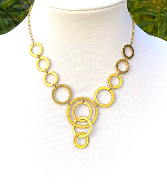Avon Circle Bib Necklace, Interlocking Goldtone C… - image 1