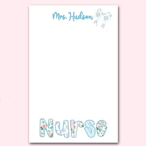 May include: White notepad with the name "Mrs. Hudson" in light blue script at the top, accompanied by a floral bow illustration. The word "Nurse" is written in large, decorative letters at the bottom, with floral and striped patterns.