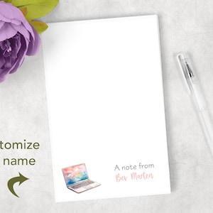 May include: A white notepad with a watercolor laptop design and the text "A note from Bev Marten". Customize the name on the notepad.
