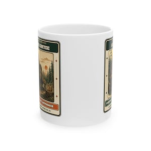 May include: A white ceramic mug featuring a rectangular graphic with a forest scene, a Bigfoot figure, and a squirrel. The text reads "MORE COFFEE" and "DO NOT APPROACH" in a vintage-style frame with orange and dark green accents.