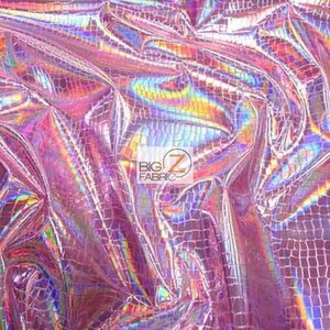May include: Pink iridescent fabric with a crocodile pattern. The fabric is shiny and has a holographic effect.