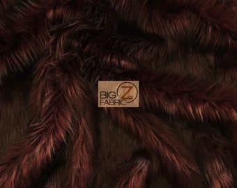 May include: Close-up of a rich brown faux fur fabric with a soft, plush texture. The fur is long and fluffy, creating a luxurious look and feel.