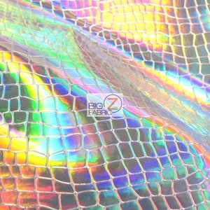 May include: A close-up of iridescent holographic fabric with a snake skin pattern. The fabric has a silver base with a rainbow sheen.