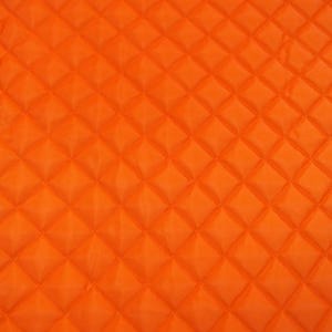 May include: A vibrant orange fabric featuring a quilted diamond pattern. The surface is composed of repeating raised square shapes stitched together in a grid, creating a textured, three-dimensional appearance across the entire material.