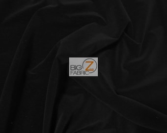 May include: Black velvet fabric with a smooth, soft texture. The fabric is draped and folded, showcasing its luxurious feel.