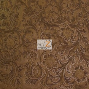 May include: Brown faux leather fabric with an embossed floral pattern. The fabric has a textured, raised design.