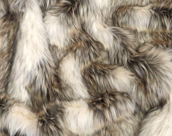 May include: A soft, plush faux fur fabric in shades of brown and white. The fur is long and fluffy, creating a luxurious and cozy look.