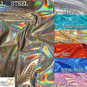 May include: A close-up of iridescent fabric with a snake skin pattern. The fabric is available in seven colors: steel, silver, turquoise, gold, red, royal blue, and pink.