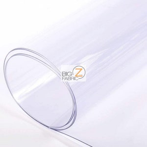 Peut inclure: Rouleau de film plastique transparent, montrant la surface lisse et transparente. Le film est flexible et durable, id&eacute;al pour divers projets d'artisanat et de bricolage.