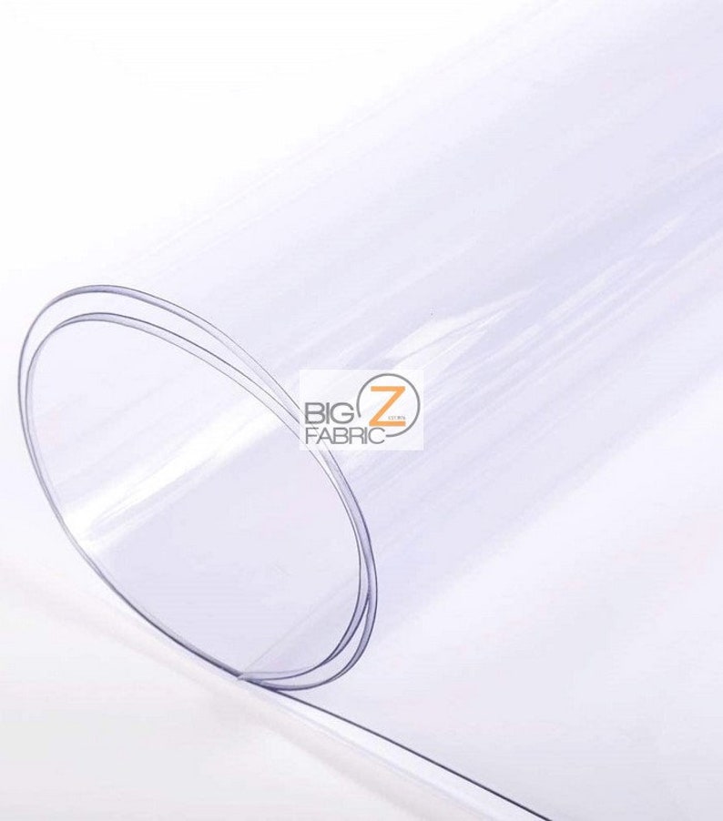 Peut inclure: Rouleau de film plastique transparent, montrant la surface lisse et transparente. Le film est flexible et durable, id&eacute;al pour divers projets d'artisanat et de bricolage.