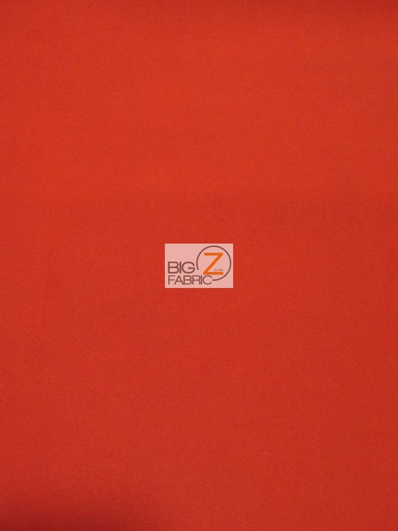 May include: A solid red fabric swatch. The fabric is smooth and has a slight sheen. The swatch is labeled "BIG Z FABRIC" in the bottom center.