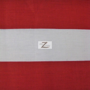 May include: Red and white striped fabric with a small white label that says "Biz Fabric".