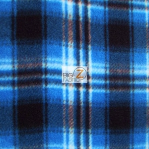 Puede incluir: Tela polar a cuadros azules, blancos y negros. La tela tiene una textura suave y peluda.  BIG Z FABRIC está impreso en la tela.