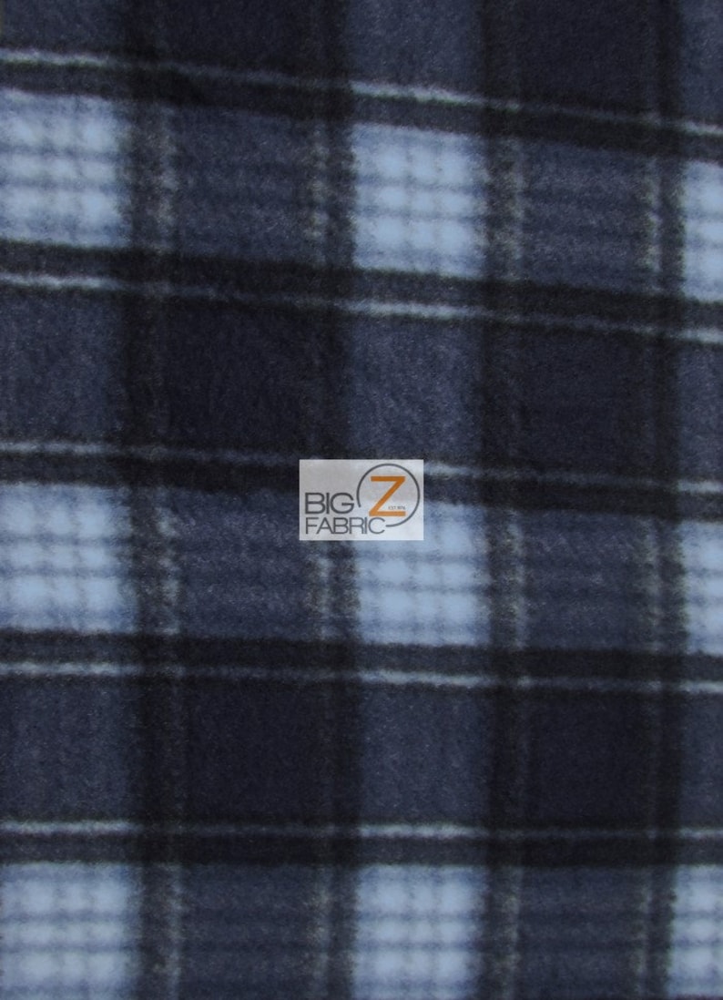 May include: Blue and white plaid fleece fabric. The fabric has a soft, fuzzy texture.  BIG Z FABRIC is printed on the fabric.