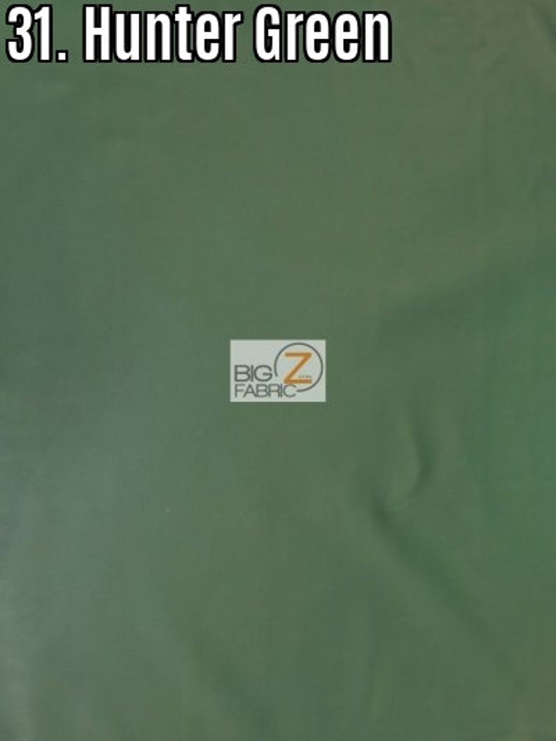 May include: A close-up of a hunter green fabric swatch. The fabric is smooth and has a slight sheen. The text "31. Hunter Green" is visible at the top of the image. The text "BIG Z FABRIC" is visible in the lower right corner of the image.