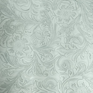May include: A close-up of a light gray embossed fabric with a floral pattern. The fabric has a textured surface and a subtle sheen.