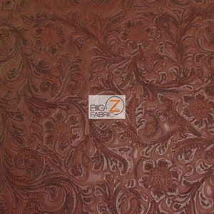 May include: Brown faux leather fabric with an embossed floral pattern. The fabric has a textured, raised design.