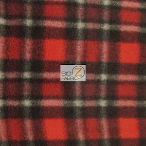 Könnte beinhalten: Roter, schwarzer und weißer karierter Fleece-Stoff. Der Stoff hat eine weiche, flauschige Textur.
