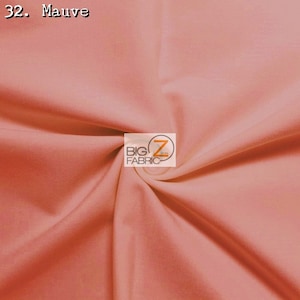 May include: A close-up of a soft, mauve-colored fabric. The fabric is smooth and has a slight sheen. The fabric is folded in a way that shows its texture. The text "32. Mauve" is visible in the top left corner of the image. The text "BIG Z FABRIC" is visible in the center of the image.