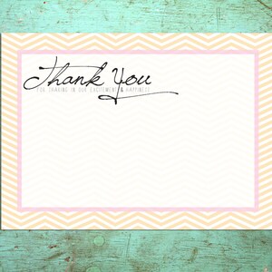 May include: A thank you card with a white background and a pink and peach chevron border. The words "Thank You" are written in elegant black script, with the phrase "For sharing in our excitement & happiness" below.