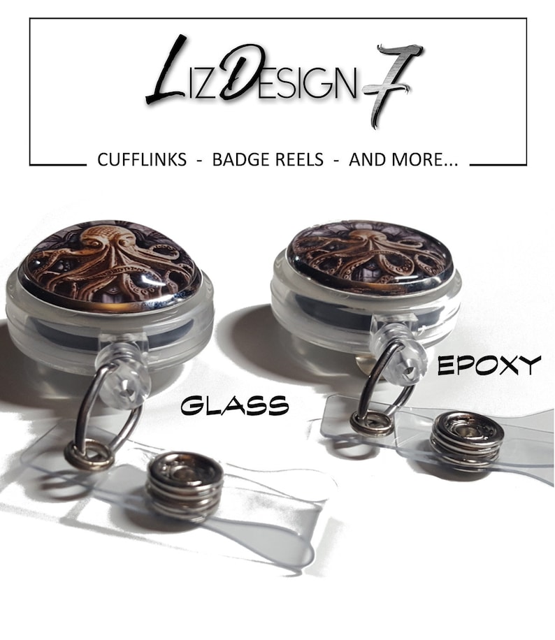 May include: Two retractable badge reels with a graphic of an octopus. The reel on the left has a glass dome and the reel on the right has an epoxy dome. The text "GLASS" is below the left reel and the text "EPOXY" is below the right reel.