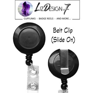 May include: Black retractable badge reel with a slide-on belt clip. The reel has a clear plastic badge holder.