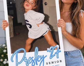 May include: A rectangular white photo frame prop featuring a printed image of a child posing, with the blue script text Presley '27 and the word SENIOR printed in black below the image, accented by four white star icons in the top left corner.