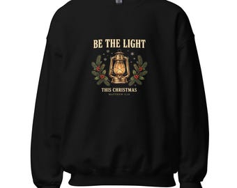 Be The Light — Christmas Lantern Faith Sweatshirt