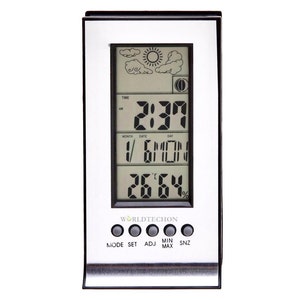 May include: A silver-framed digital weather station displaying the time as 2:37 AM, the date as 1/6/MON, and the temperature and humidity as 26.64%. The top section shows weather icons. The brand name "WORLDTECHON" is visible.