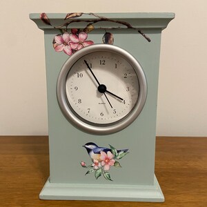 May include: A rustic wooden sign with the text "Welcome to our home" in a handwritten style. The sign features a distressed finish and a simple, inviting design, perfect for a front porch or entryway.