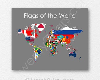 May include: A gray rectangular wall art print featuring a world map composed of various national flags. The text "Flags of the World" is printed in white at the top center. The design displays colorful flag patterns within the shapes of continents.