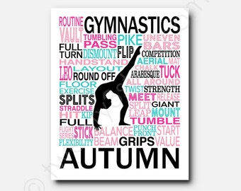 May include: A rectangular wall art print featuring a black silhouette of a gymnast performing a backbend. The background is filled with gymnastics-related words in black, pink, and light blue text, including the name AUTUMN in large black letters.