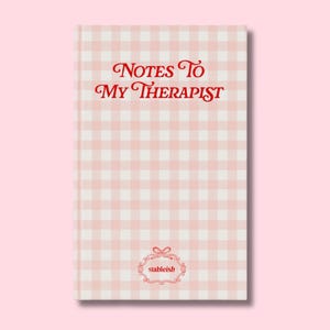 May include: A hardcover notebook with a pink and white gingham pattern. The cover features the text "Notes To My Therapist" in red script. The brand name "stableish" is displayed in a decorative frame at the bottom.