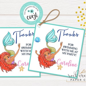 May include: Two printable thank you tags featuring a mermaid with red hair and a turquoise tail. The text on the tags reads "Thanks for swimming with me at my party!" and includes the names "Caro" and "Caroline".