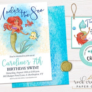 May include: An invitation to a 7th birthday party with an under the sea theme. The invitation features a mermaid with red hair and a teal tail, a yellow fish, and the text "Under the Sea" in blue and white. The invitation also includes the text "Caroline's 7th Birthday Swim!" and details about the party, including the date, time, and location.
