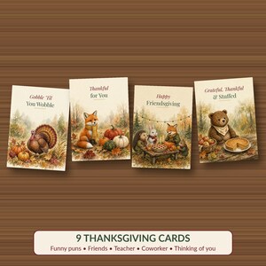 May include: Four rectangular greeting cards featuring watercolor illustrations of autumn scenes. The cards display text reading Gobble 'Til You Wobble, Thankful for You, Happy Friendsgiving, and Grateful, Thankful & Stuffed with woodland animals.