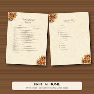 May include: Two off-white paper sheets featuring Thanksgiving Trivia and an Answer Key. Both pages are decorated with autumn-themed illustrations of pumpkins, berries, and fall leaves in the corners. The text includes twelve questions.