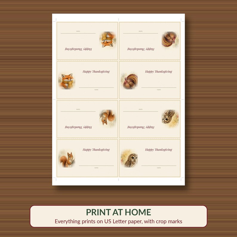 May include: A printable sheet of eight rectangular place cards on a white background, each featuring the text Happy Thanksgiving, a line for a name, and illustrations of a fox, turkey, squirrel, or owl with soft brown and orange tones.