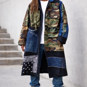 May include: A rustic wooden sign with the text "Welcome to our home" in white lettering. The sign features a distressed finish and a simple, inviting design, perfect for front door decor.