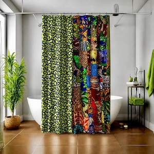 May include: A shower curtain featuring a split design. The left side displays a repeating dark blue and lime green swirling pattern. The right side showcases a vibrant patchwork of various colorful geometric and organic African-inspired prints.