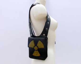 Rock & Rave in style with our leather double shoulder holster bag hand tooled radioactive symbol