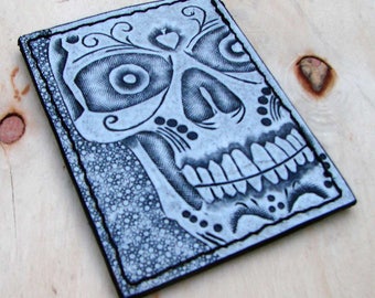 white skull card holder