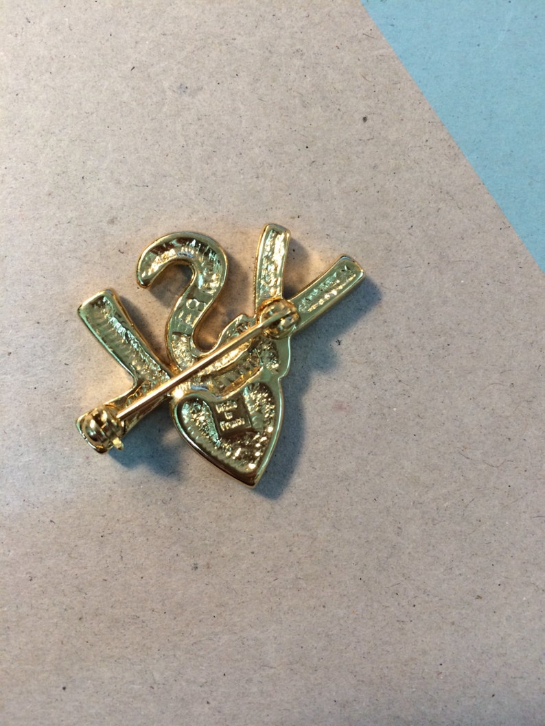 yves saint laurent brooch pin