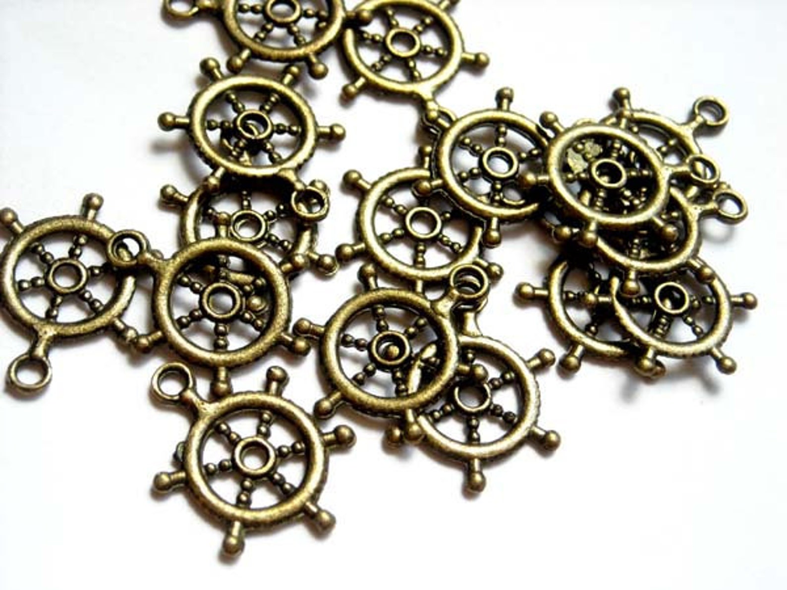 10 Antique Bronze Nautical Ship Wheel Charms 21642 Etsy
