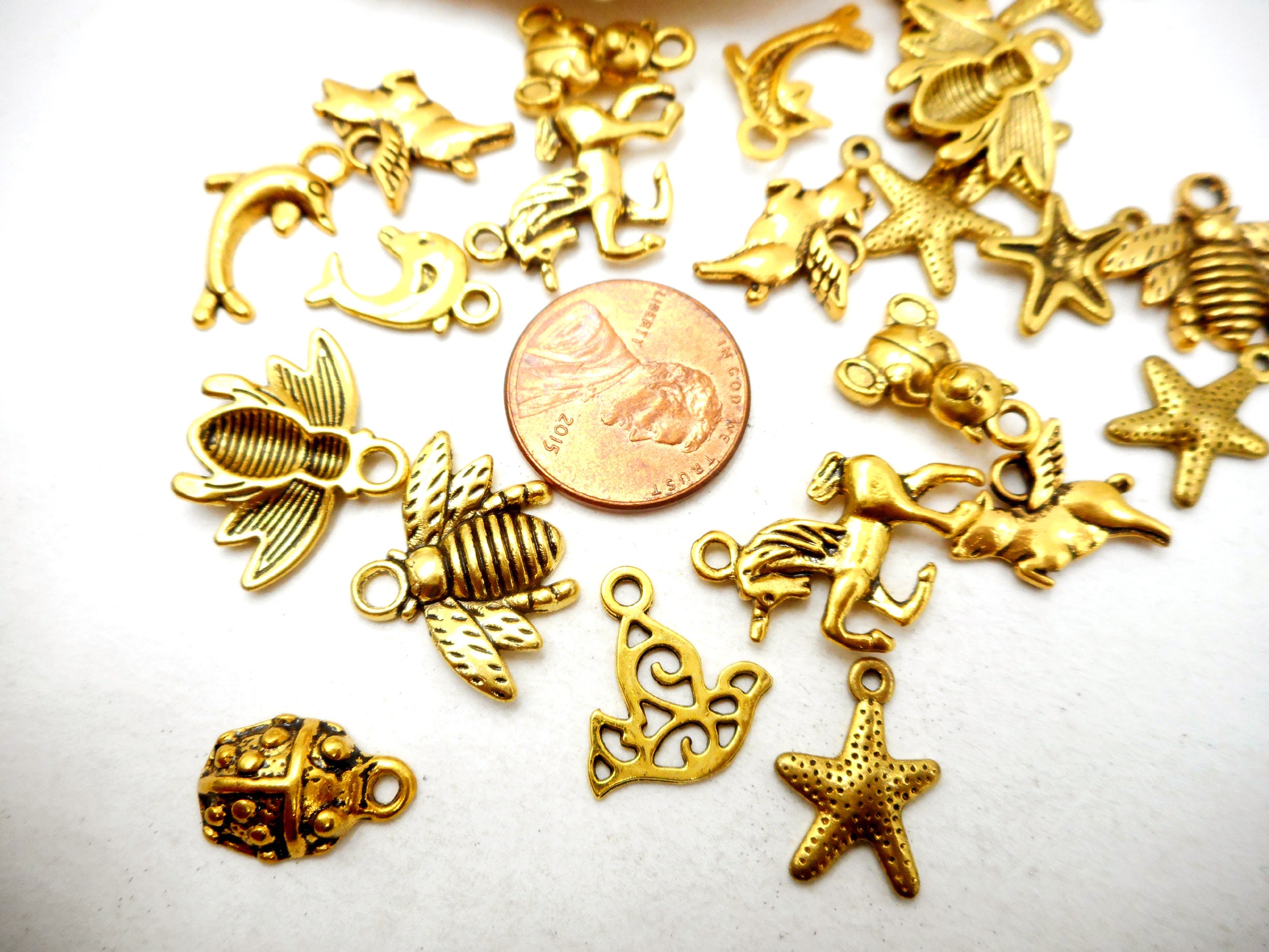 24 Assorted Antique Gold Charms - 23-33-20A