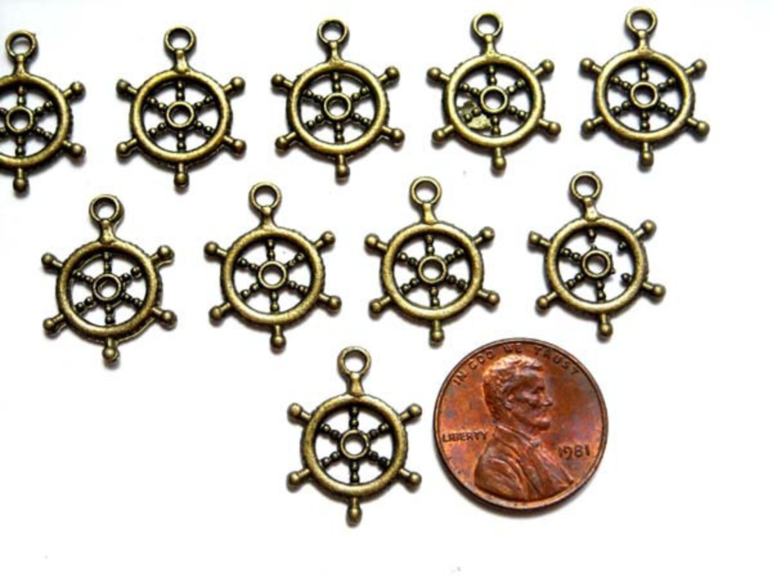 10 Antique Bronze Nautical Ship Wheel Charms 21642 Etsy