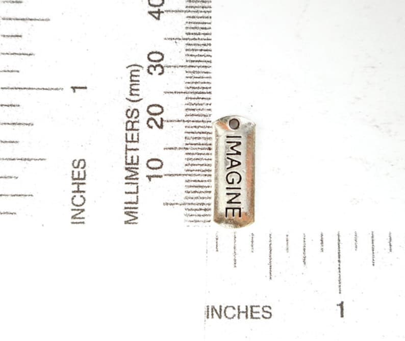 22-10-1 6 Antique Silver Imagine Word Charms