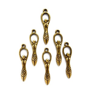 May include: Seven antique gold-toned metal charms featuring a stylized female figure with a spiral design. The charms are perfect for jewelry making or crafting.