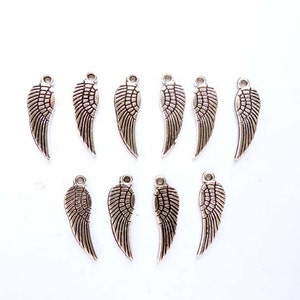 10 Antique Silver Angel Wing Charms - 22-2-6
