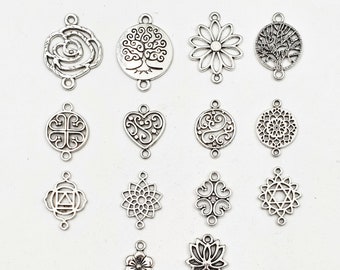 14 verschillende antieke zilveren tussenstukken/bedels - 21-13-7